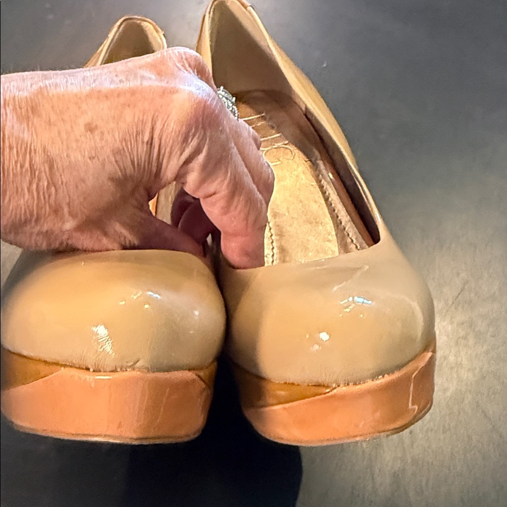 BCBG Paris Nude Patent Leather Platform Pumps
Size 6.5 - Picture 4 of 10